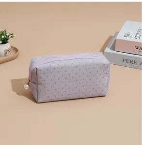 Corduroy cosmetic bag with glitter dots and pearl zipper pull, large capacity storage.