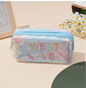 Transparente Kosmetiktasche mit Batik-Sternen, Glitzer-Pailletten und süßem Schriftzug.