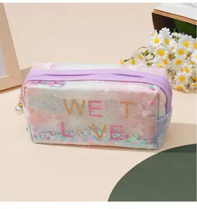 Transparente Kosmetiktasche mit Sternenmuster, Pailletten und praktischem Reißverschluss.