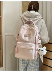 Rosa Studentenrucksack mit Sternenmuster und süßem Plüschhasen-Schlüsselanhänger