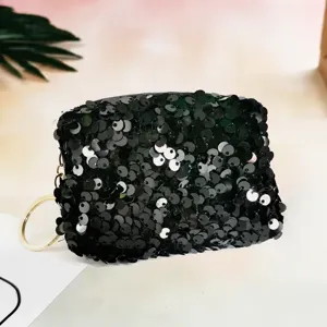 Black sequin mini coin purse detail view, fashionable small lipstick and essential storage pouch.