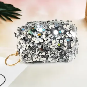 Detailed close-up view of the sparkling sequin mini coin pouch featuring gold keyring.