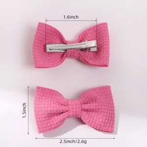 Detailansicht mit Maßen der rosa strukturierten Haarschleifen für Kinder