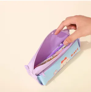 Close-up detail of the cute macaron color canvas pencil case with large capacity and cartoon print.