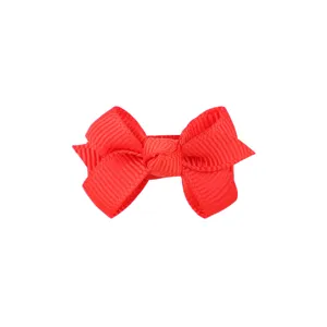 Classic red grosgrain ribbon bow hair clip for baby girls with textured knot detail