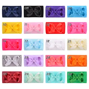 Detailed view showing a palette of 20 vibrant assorted colors for soft nylon baby bow headbands