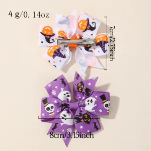 Set of two Halloween grosgrain ribbon hair bows with festive pumpkin and ghost prints