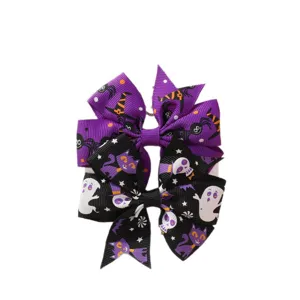 Set of Halloween grosgrain ribbon hair bows featuring ghost and spider patterns