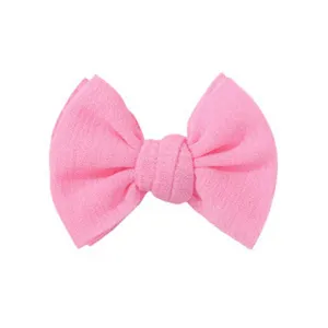 Fermaglio per capelli rosa con fiocco in tessuto per bambine dolci