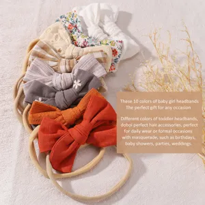 Set van 10 kleurrijke baby meisjes hoofdbanden met grote strikken en nylon elastiek.