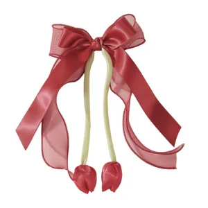 Elegant red bow hair clip for kids featuring satin tulip pendants and long streamers.