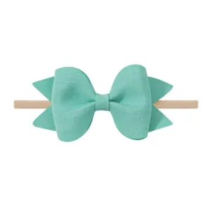 Diadema con lazo verde menta para bebés con banda elástica de nailon suave y cómoda