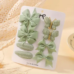 Cute 8-piece sage green hair clip set with ribbon bows and knitted butterflies for girls