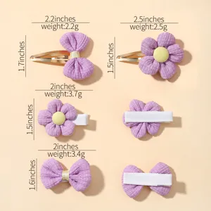 Detailed product specifications showing weight and size for purple corduroy bow hair clips