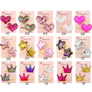 Set of 15 sequin heart star and crown hair clips for kids on pink display cards