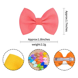Detailed dimensions and scale for small solid ribbed ribbon bow hair clip for kids