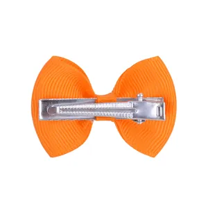 Detailed back view of an orange grosgrain bow hair clip with silver alligator clip