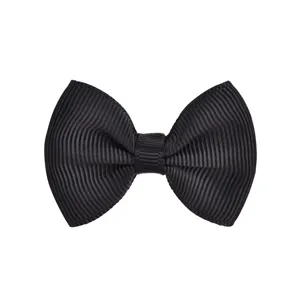 High-quality close-up detail of a classic black ribbed grosgrain hair bow for kids