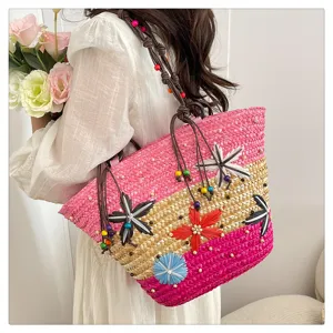 Bohemian colorful woven straw tote bag with floral accents and beaded straps for women