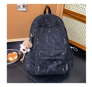 Large capacity black backpack with white lightning bolt prints and cute bear keychain