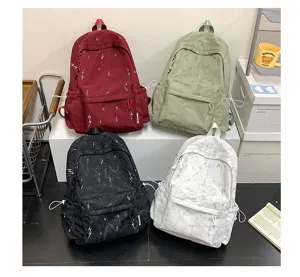 Large capacity lightning pattern school backpacks in maroon, sage green, black, and white