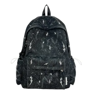 Close-up of stylish black school backpack featuring white lightning and starry print