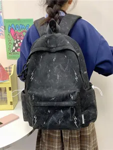 Large capacity black school backpack for girls featuring white lightning bolt patterns