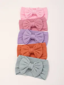 Conjunto de accesorios para el cabello de bebé liso con diadema elástica de nailon.