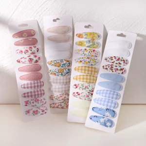 Assorted set of floral and plaid fabric snap hair clips in various pastel colors