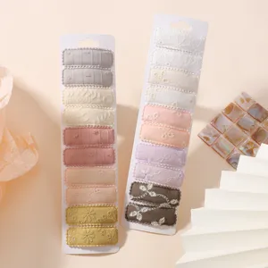 Set of cute floral embroidered hair clips for girls in various pastel colors