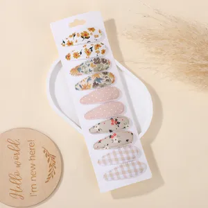 10-piece floral and checkered fabric BB hair clip set with water-drop design for girls