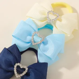 Kids rhinestone bow hair ties cute set, baby elastic hair bands for girls daily styling.