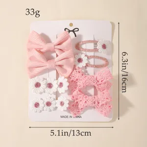 Set de 8 pinzas para el pelo rosa con lazos y flores para niñas, tarjeta de 13x16cm