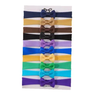 Set of 10 colorful elastic nylon baby headbands featuring ribbed grosgrain bows