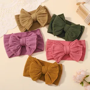 Set of 5 colorful baby wide headbands with large bows and elastic jacquard fabric texture
