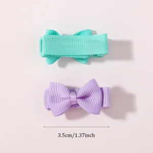 Set of two mini solid color grosgrain ribbon bow hair clips for toddler girls, 3.5cm