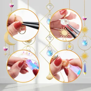 Detailed view of DIY suncatcher assembly process using crystals and gold metal charms