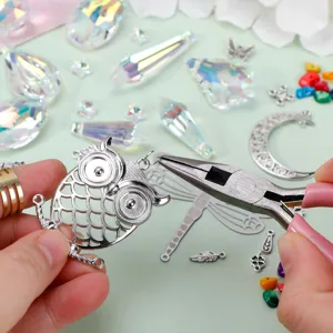 DIY sun catcher kit featuring owl pendant, crystal prisms and jewelry making tools