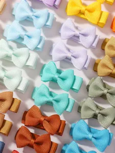 Detailed collection of colorful mini grosgrain ribbon bow hair clips set for toddlers