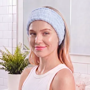 Soft coral fleece headband detail view, ideal for daily makeup and skincare routines.