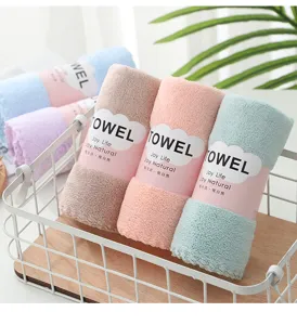 Coral fleece face towel soft thickened absorbent quick drying towel detail view showcase clean display.