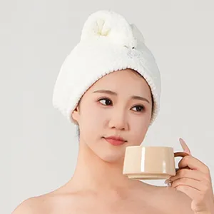White coral fleece quick-drying hair turban with cute bear decor, soft and super absorbent.