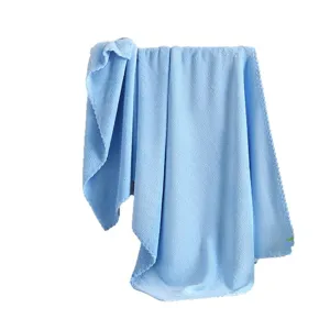 Solid color coral fleece bath towel blue soft and quick dry hanging main display view