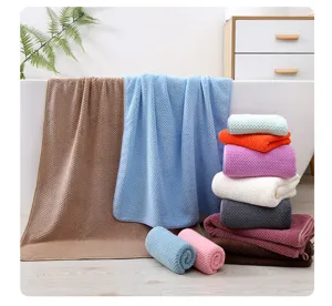 Juego de toallas de baño y cara de forro polar coral con rejilla de piña, muy absorbente.