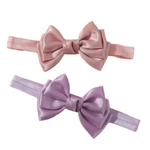 Lot de deux bandeaux pour bébé avec grands nœuds en satin rose et violet élégants