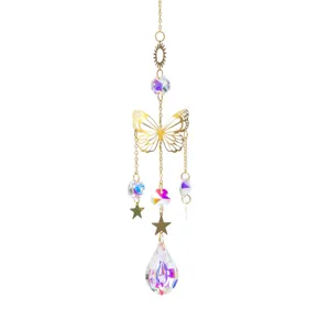 Detailed view of an elegant golden butterfly crystal suncatcher with rainbow prism pendant