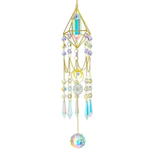 Close-up detail of iridescent crystal suncatcher with gold mandala iron frame