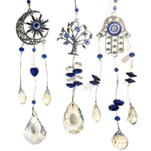 Acchiappasole in cristallo con malocchio e mano di hamsa per decorazione finestra.