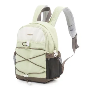 Detailed side view of the small outdoor backpack with pale green and white contrast