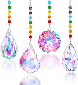 Detailed view of rainbow crystal suncatchers with various multifaceted prism pendants